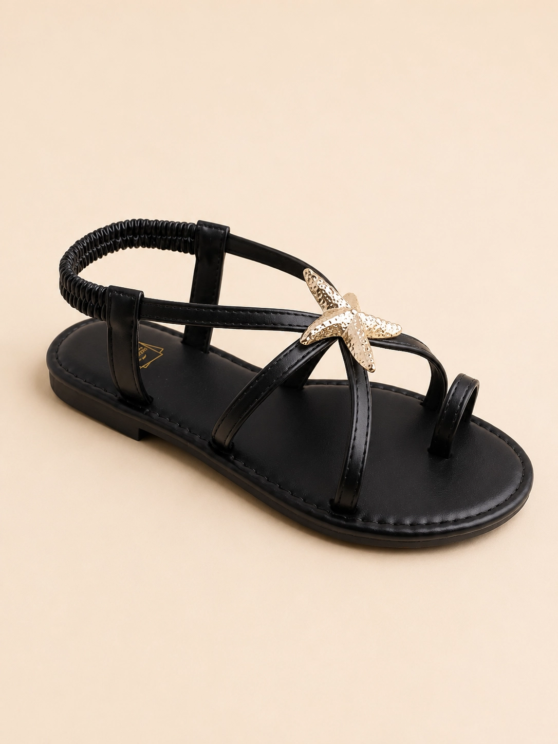 Sandale femme plate entre-doigt avec étoile de mer
